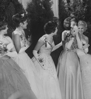 "At the 1962 National College Queen contest. Utah State University's Cecilia Harrison won the title that year. Competitions including ironing blouses and cooking hamburgers"